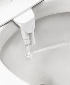 Bidet à boutons de contrôle et à double buses